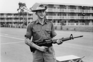 Griffo with an M16